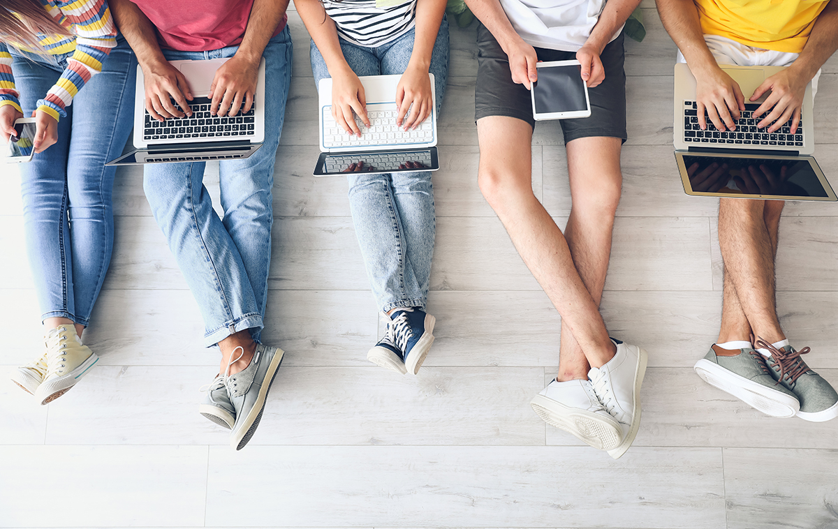 Students With Modern Devices Studying Online Indoors Students With Modern Devices Studying Online Indoors